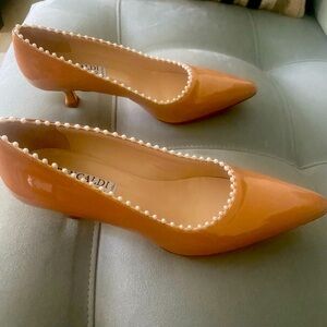 Beautiful beige patent leather pumps